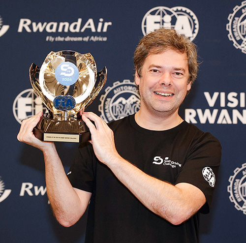 Alexandre holding 2024 FIA SDC trophy